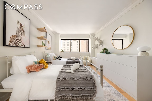 32 E 76th St Unit 805, New York City, NY 10021 - bedroom with crown molding and wood finished floors