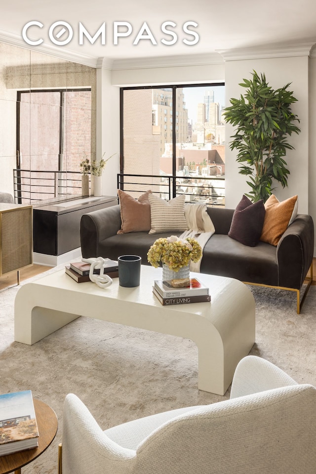 32 E 76th St Unit 805, New York City, NY 10021 - living area with crown molding, plenty of natural light, and a city view