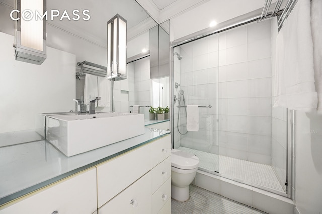 32 E 76th St Unit 805, New York City, NY 10021 - bathroom featuring vanity, a shower stall, tile patterned flooring, and crown molding