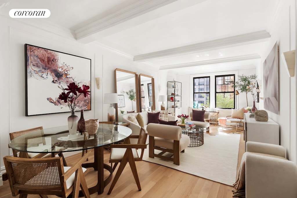 23 W 73rd St Unit 306, New York City, NY 10023 - living area with visible vents, ornamental molding, light wood-style flooring, and beamed ceiling