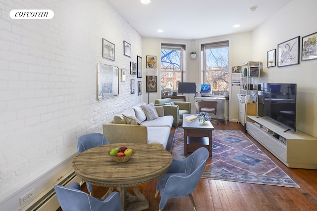 658 Park Pl Unit 1, New York City, NY 11216 - living area with brick wall, wood finished floors, and recessed lighting