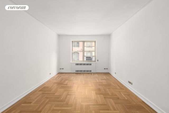 spare room with visible vents and baseboards
