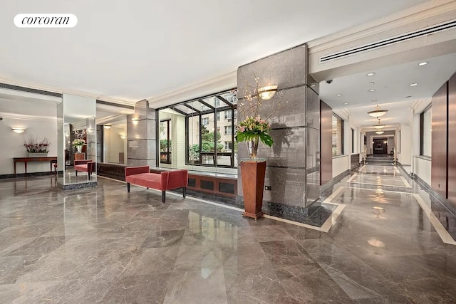 415 E 52nd St Unit 11Fc, New York City, NY 10022 - common area featuring crown molding