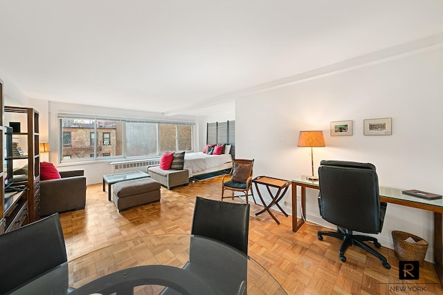 240 E 55th St Unit 5-C, New York City, NY 10022 - home office with baseboards and radiator heating unit