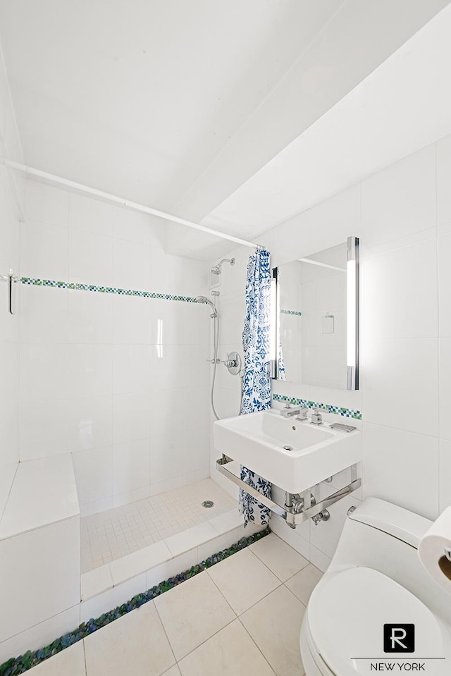 240 E 55th St Unit 5-C, New York City, NY 10022 - bathroom with a stall shower and tile patterned floors