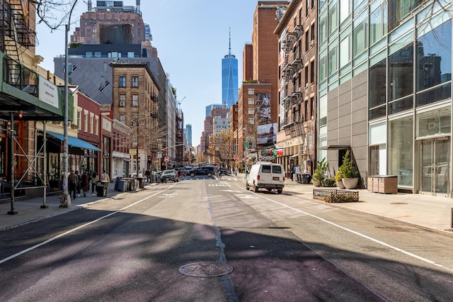 349 W Broadway Unit 9, New York City, NY 10013 - view of asphalt road with a view of skyline, sidewalks, street lighting, and curbs