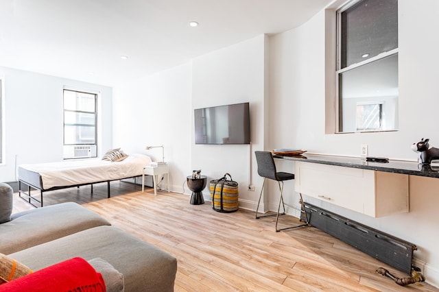 349 W Broadway Unit 9, New York City, NY 10013 - living area featuring light wood-style floors, cooling unit, and recessed lighting