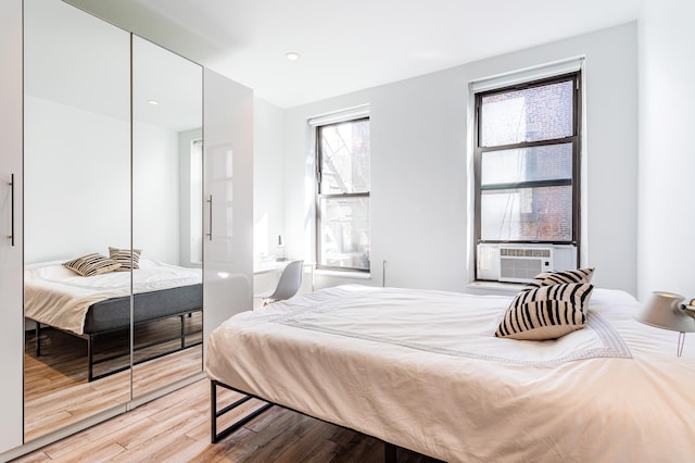349 W Broadway Unit 9, New York City, NY 10013 - bedroom with cooling unit and light wood finished floors