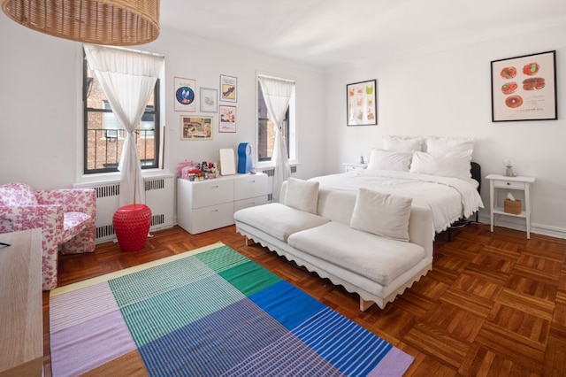 bedroom featuring radiator