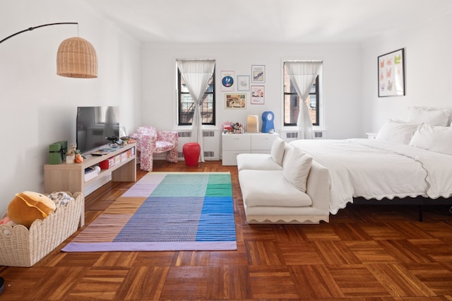 bedroom featuring radiator