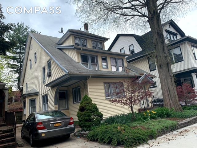 642 E 26th St, New York City, NY 11210 - american foursquare style home featuring a chimney