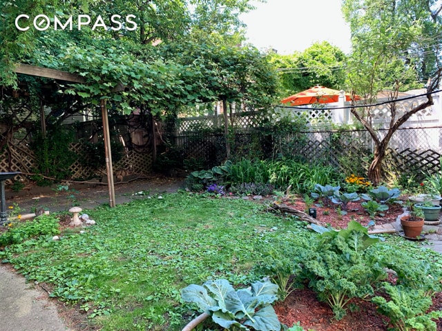 view of patio / terrace featuring fence