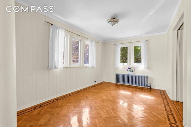 642 E 26th St, New York City, NY 11210 - spare room with radiator heating unit and baseboards