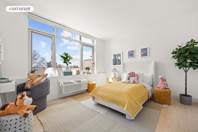 bedroom with light wood-style flooring