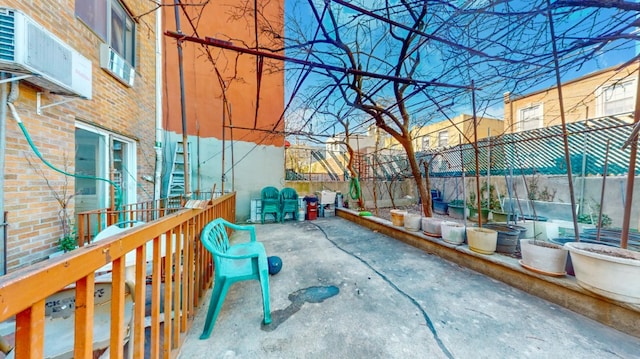 view of patio / terrace featuring fence