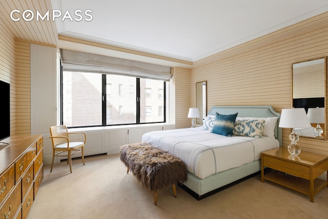 bedroom featuring light carpet