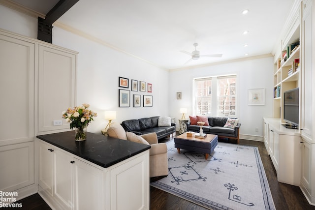 living area with ornamental molding, dark wood-style floors, a ceiling fan, and recessed lighting