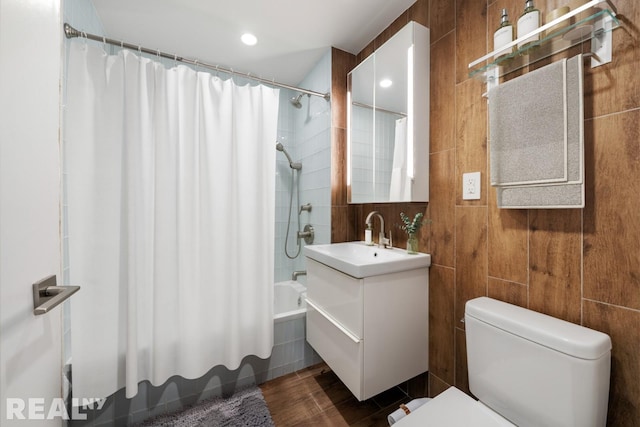 143 Meserole St Unit 1A, New York City, NY 11206 - full bathroom featuring vanity, shower / bathtub combination with curtain, and toilet