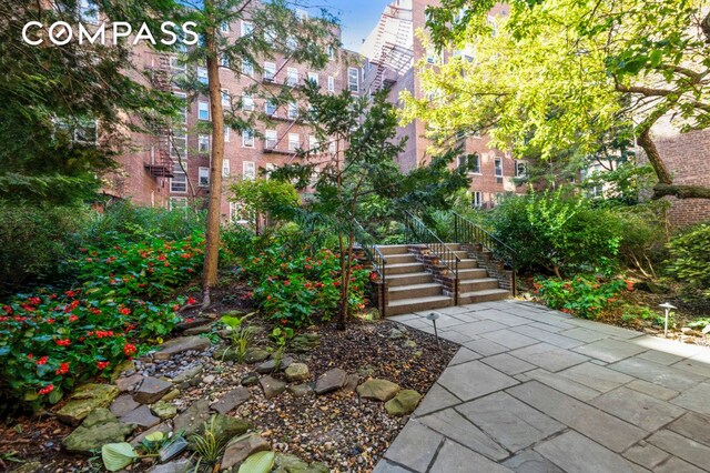 view of yard featuring stairs