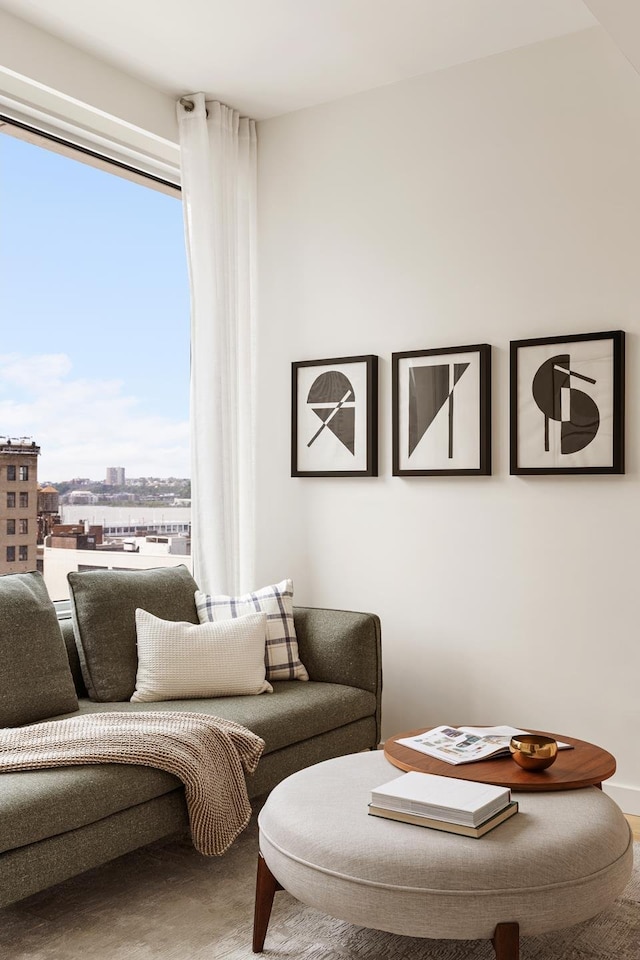 611 W 56th St Unit 12, New York City, NY 10019 - living room featuring healthy amount of natural light and a city view