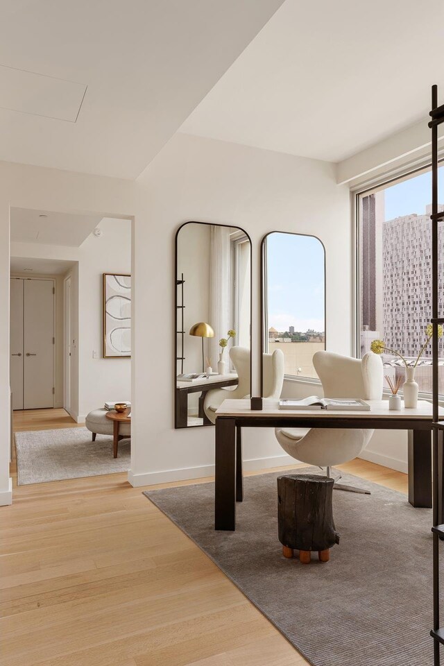 611 W 56th St Unit 12, New York City, NY 10019 - office featuring wood finished floors and baseboards