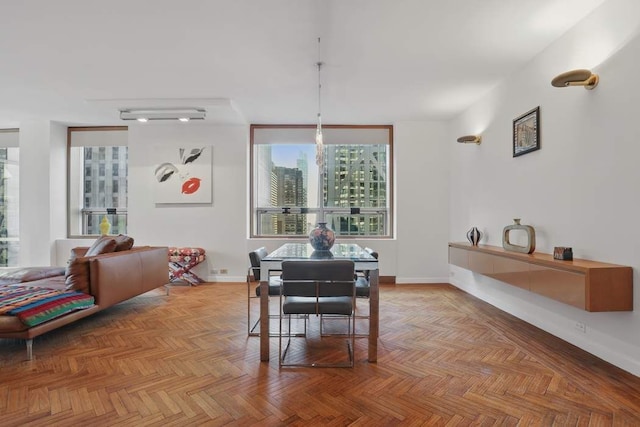 dining room featuring baseboards