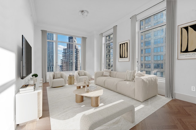 living area featuring baseboards and ornamental molding
