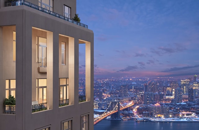 property's view of city with a water view