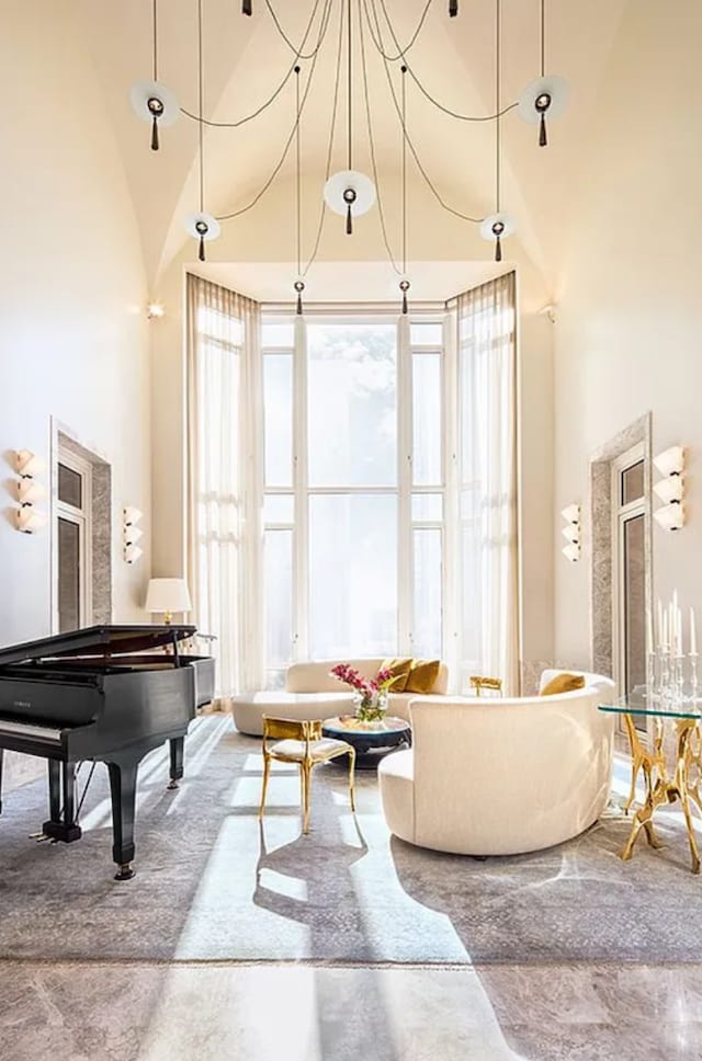 sitting room with a high ceiling
