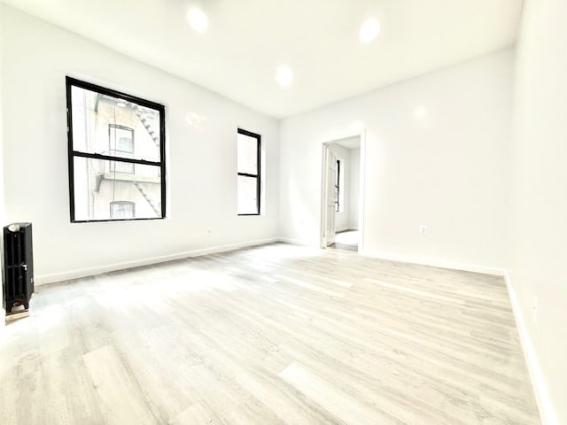 504 W 139th St Unit 14, New York City, NY 10031 - unfurnished room with light wood-style floors and recessed lighting