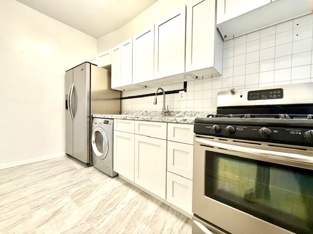 504 W 139th St Unit 14, New York City, NY 10031 - kitchen featuring stainless steel range with gas cooktop, washer / clothes dryer, tasteful backsplash, and light stone counters