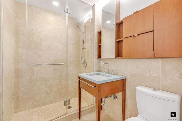 2 River Ter Unit 4-J, New York City, NY 10282 - full bathroom with tile walls, a stall shower, and recessed lighting