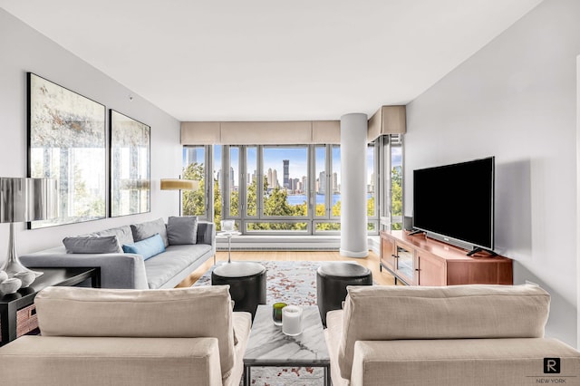 2 River Ter Unit 4-J, New York City, NY 10282 - living area with wood finished floors and healthy amount of natural light