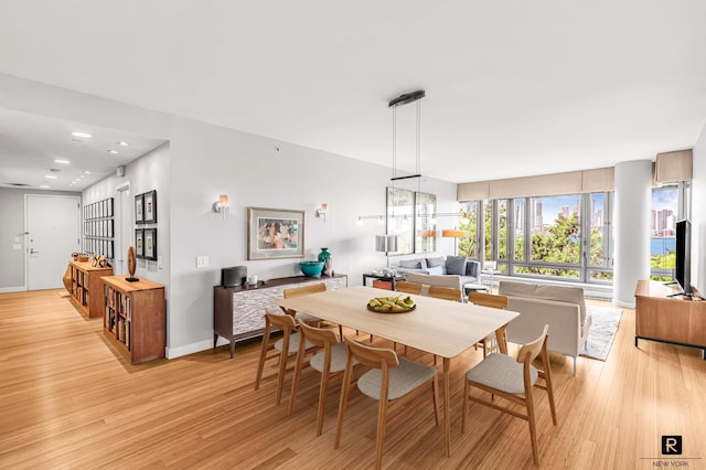 2 River Ter Unit 4-J, New York City, NY 10282 - dining area featuring light wood finished floors and recessed lighting