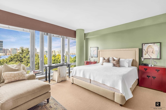 2 River Ter Unit 4-J, New York City, NY 10282 - bedroom featuring multiple windows and a view of skyline