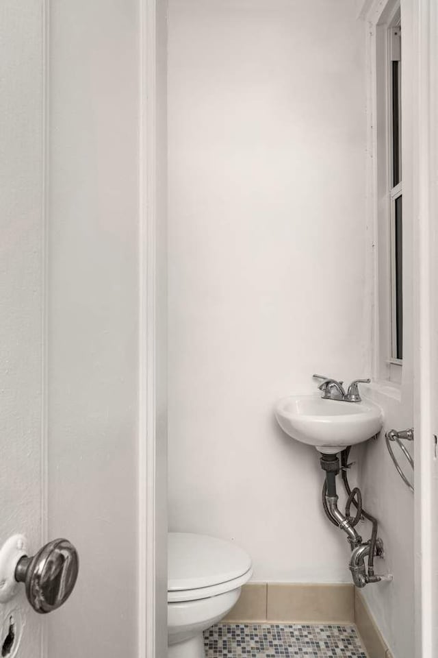260 W End Ave Unit 3D, New York City, NY 10023 - bathroom with tile patterned flooring and toilet