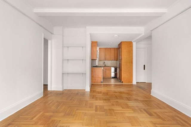 260 W End Ave Unit 3D, New York City, NY 10023 - unfurnished living room with baseboards and a sink