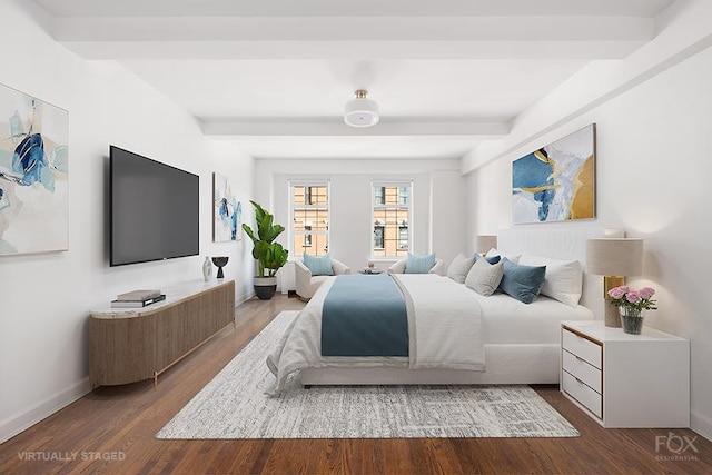 bedroom with beam ceiling, dark wood-style floors, and baseboards