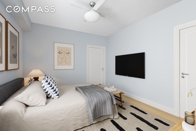 24 Monroe Pl Unit Md, New York City, NY 11201 - bedroom with wood finished floors, a ceiling fan, and baseboards