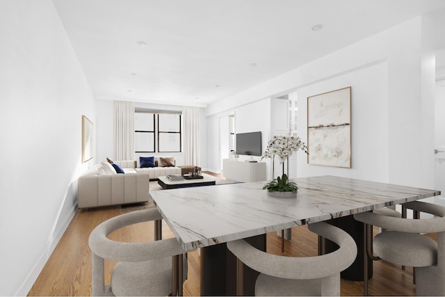 30 E 9th St Unit 5A, New York City, NY 10003 - dining room with light wood-type flooring and baseboards