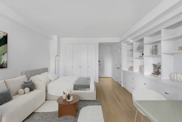 bedroom featuring light wood-type flooring