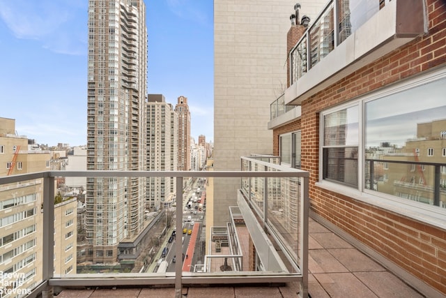 balcony featuring a city view