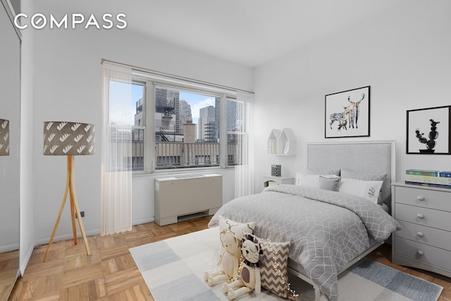 333 E 66th St Pha, Pha, New York City, NY 10065 - bedroom with radiator and baseboards