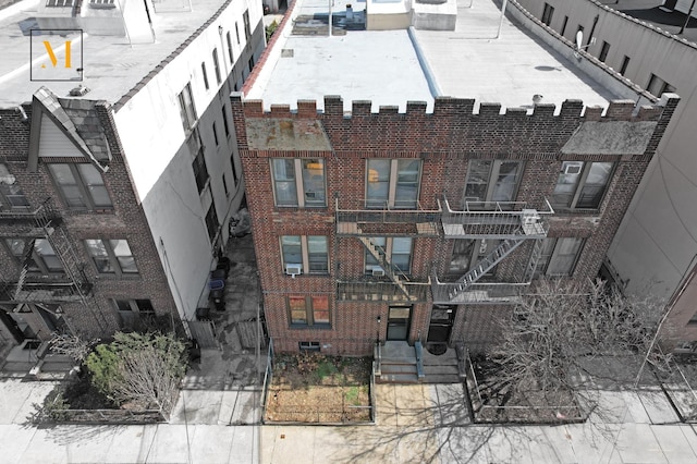 10-53 115th St, New York City, NY 11356 - view of property featuring stairway