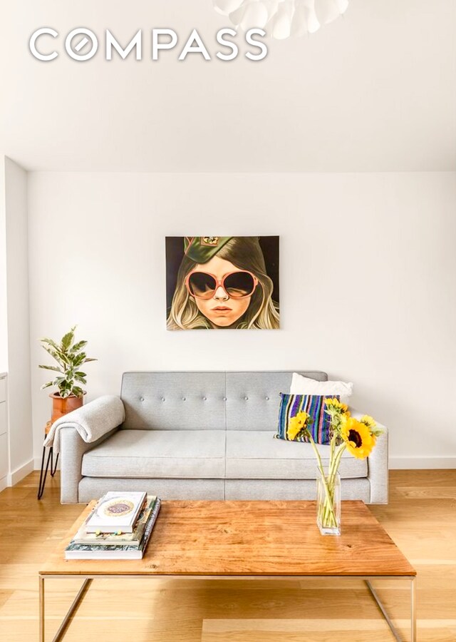 15 Charles St Unit 6G, New York City, NY 10014 - living area featuring wood finished floors and baseboards