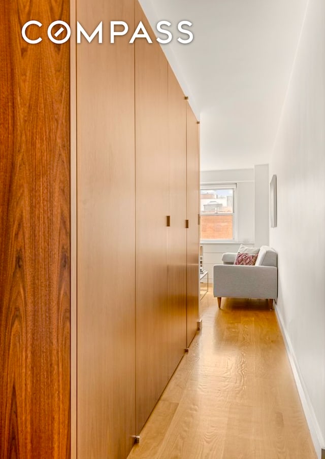 15 Charles St Unit 6G, New York City, NY 10014 - hall featuring light wood-style floors and baseboards