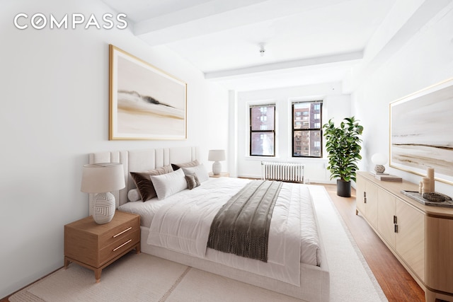 bedroom featuring radiator heating unit