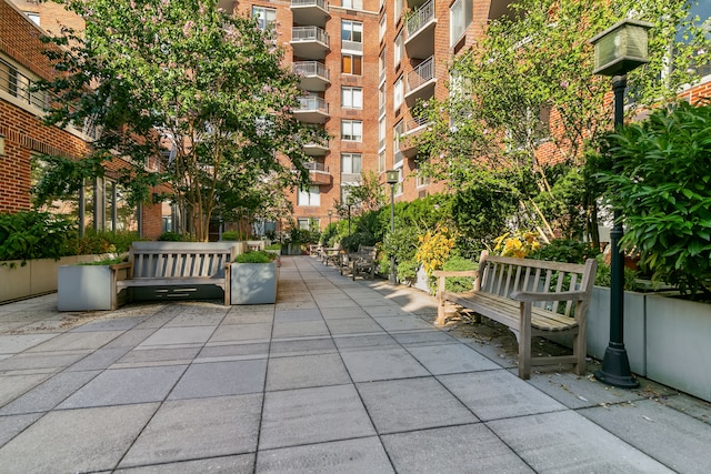 view of home's community featuring a patio area