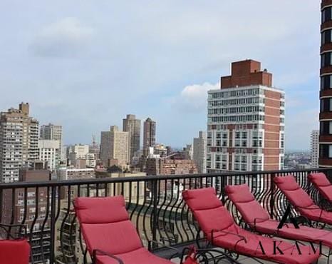 343 E 74th St Unit 7-J, New York City, NY 10021 - balcony with a view of city