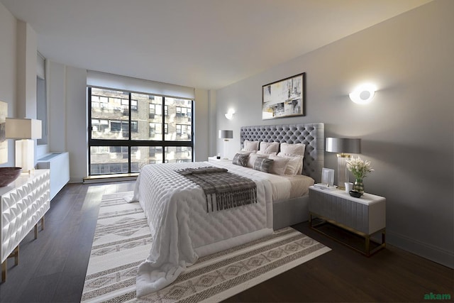 bedroom featuring baseboards and wood finished floors